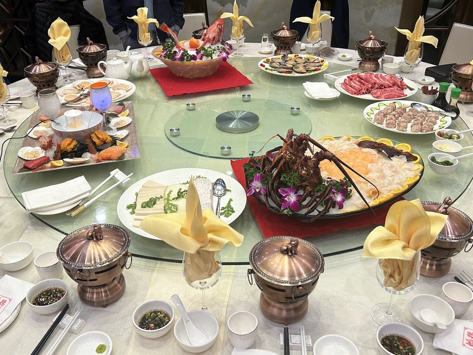 Chinese seafood entrées served for sharing.